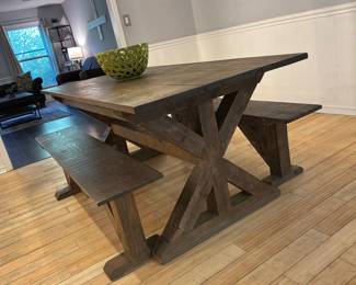 Rustic farmhouse dining table with bench seating 