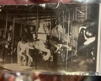 Lot 115: Kids Riding A merry-go-round Photograph