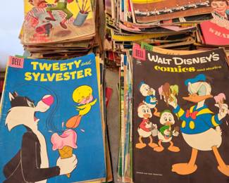 $3 each - Dell Walt Disney's comics as is - basement smell