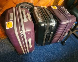 All new hard shell rolling suitcases