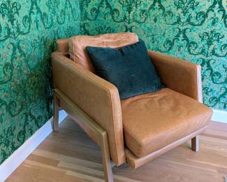 Cognac tan leather lounge chair with wood frame. Mid-century modern accent chair.