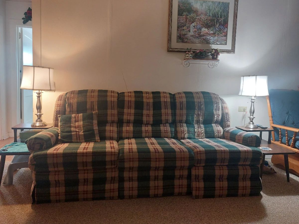 Green and Beige recliner couch
