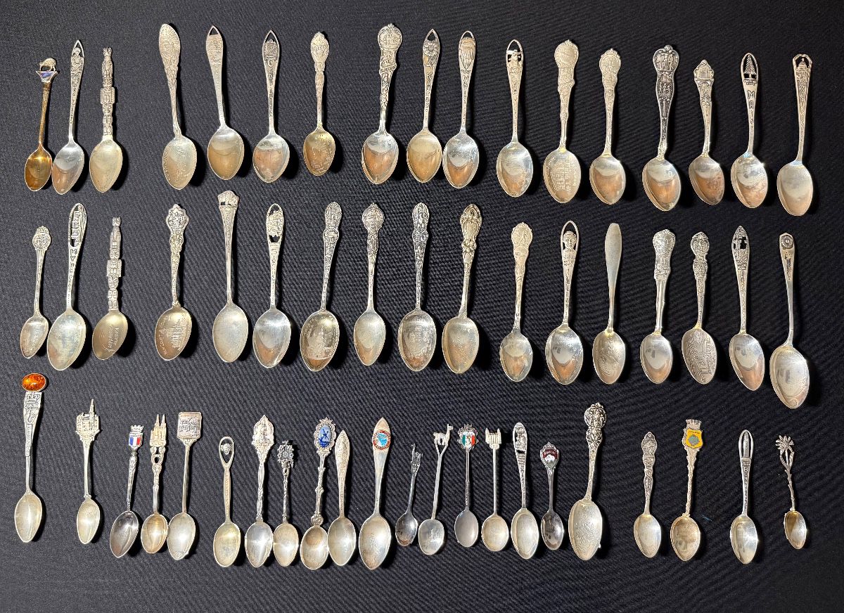 Large collection of solid silver spoons