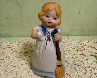 Girl with broom figurine
