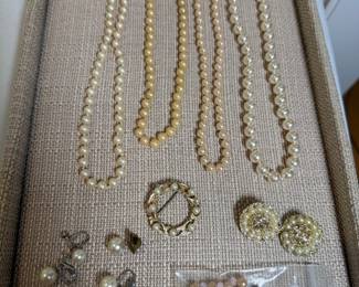 Collection of pearl like jewelry