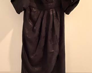 High-End Ladies’ Designer Clothing, predominantly Size 16 / XL. Sizes May Vary.