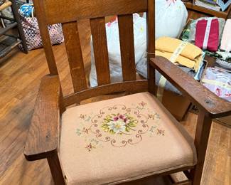 Oak rocker with needle point bottom