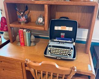 Desk and we have 2 vintage typewriters