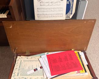 piano bench and music sheet