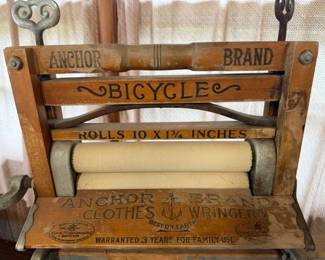 Antique clothes wringer.