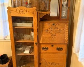 Beautiful antique Oak secretary. Dazey butter churns.