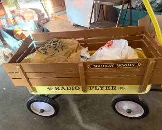 Vintage Yellow Radio Flyer wagon.