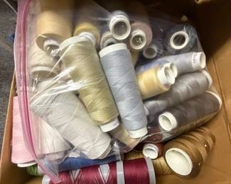 Where there is material, there is thread. Boxes. Many new in package.