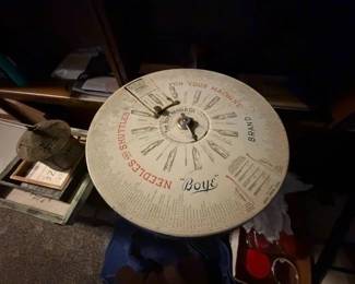 Antique needle dispenser.