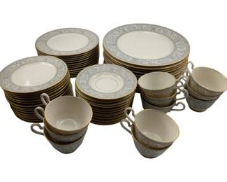 288 - Franciscan Renaissance China Dinnerware Set (Description): Franciscan china dinnerware set featuring an elegant gray scrollwork border with gold trim. The set includes dinner plates, salad plates, saucers, and cups.