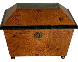 1055 - Burl Wood Tea Caddy Box 9"x11"x7.5" (Description): A tea caddy with burl wood veneer construction, featuring a decorative lid and brass keyhole escutcheon on the front. The piece rests on ball feet. Measures 9 inches by 11 inches by 7.5 inches.