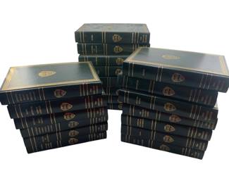 344 - The Harvard Classics Group Lot of Books (Description): A group lot of books from The Harvard Classics series. These volumes feature classic dark green bindings with gold decorative borders and embossed medallion designs on the covers, characteristic of this distinguished literary collection.