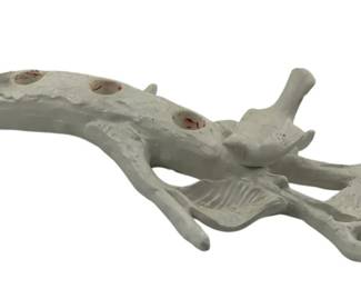 252 - Ceramiche Virginia Italian Candle Holder (Description): Ceramiche Virginia candle stick featuring a naturalistic branch design with bird figures and leaf details. The piece is finished in white and includes multiple candle holders. Measures 3 inches high by 16 inches long by 7 inches wide.