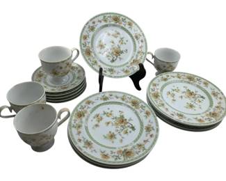 294 - Noritake Ireland Set of China (Description): A set of Noritake Ireland china featuring a floral pattern with green border accents. The set includes cups, saucers, and plates in coordinating designs.