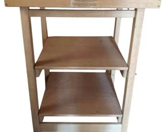 1026 - Wood Rolling Kitchen Cart 36"x25"x23" (Description): Wood rolling kitchen cart featuring multiple shelves for storage and mounted on casters for easy mobility. Measures 36 inches high by 25 inches wide by 23 inches deep.