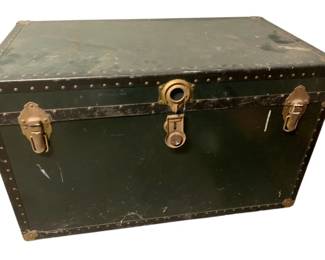 823 - Green Trunk 22"x36"x20" (Description): Green trunk with brass-tone hardware and metal corner reinforcements. Measures 22 inches high by 36 inches wide by 20 inches deep.
