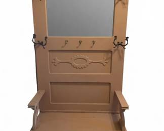 708 - Painted Hall Tree 80"x34"x16" (Description): Painted hall tree featuring a central mirror, decorative carved scrollwork on the crown and back panel, multiple metal coat hooks, a storage bench seat with lift-top compartment, and side armrests. Measures 80 inches tall by 34 inches wide by 16 inches deep.