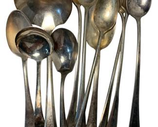 2006 - 11pc Plated Flatware (Description): The assortment includes various serving spoons and utensils in assorted patterns.