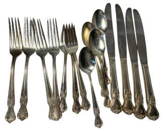 2002 - Old Company Plate 16pc Flatware (Description): The collection includes an assortment of forks, spoons, and knives in a matching decorative handle pattern.
