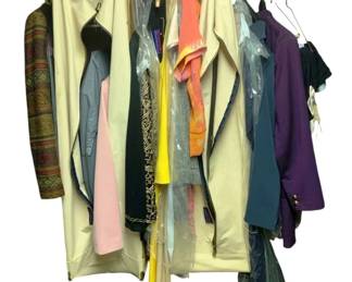 836 - Group Lot of Vintage Clothes (Description): A group lot of vintage clothes featuring an assortment of garments in various colors and styles. The collection includes multiple pieces suitable for different occasions, displaying the diverse fashion sensibilities of their era.