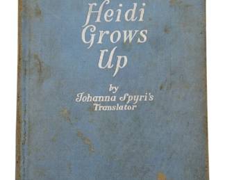875 - Heidi Grows Up 1938 Copyright Book (Description): Heidi Grows Up, a sequel to the beloved Heidi story, with a 1938 copyright. This classic children's book continues the adventures of the Swiss Alps heroine. The volume features a blue cloth hardcover binding with white lettering on the front cover.