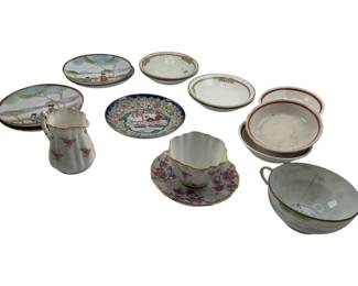 289 - Group Lot of Assorted China (Description): A group lot of assorted china pieces including various plates, saucers, cups, a small pitcher, and bowls in different patterns and styles.