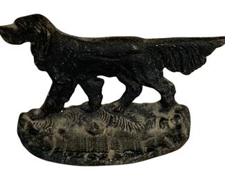 1051 - Cast Iron Dog Bookend 3"x5" (Description): Cast iron dog figure measuring 3 inches by 5 inches. The piece features a hunting dog in a pointing stance, mounted on a naturalistic base.