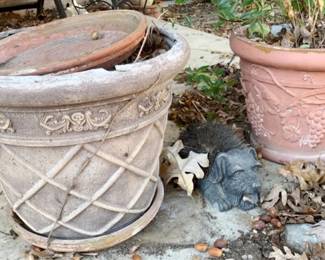1000 - Group Lot of Planters & Bootscraper (Description): A group lot consisting of planters and a bootscraper. The lot includes decorative outdoor planters and a figural bootscraper suitable for garden or patio use.