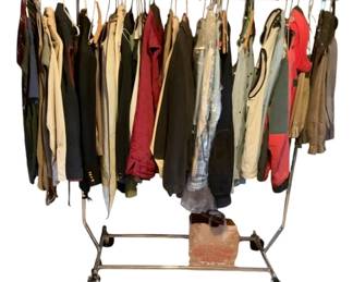 1136 - Metal Clothes Rack w/ Clothes 55"x50" (Description): Metal clothes rack on casters with an assortment of clothing items included. The rack measures 55 inches by 50 inches.