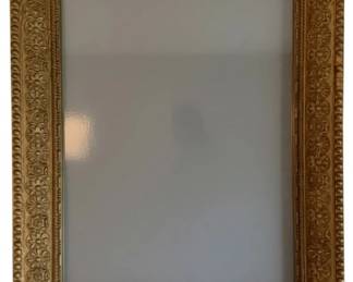 760 - Gold Framed Wood Mirror 25"x20" (Description): Gold framed wood mirror featuring ornate carved detailing. Measures 25 inches by 20 inches.