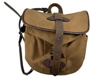 682 - Filson Bag 10"x10"x4" (Description): Filson bag featuring canvas construction with leather trim and straps. Measures 10 inches by 10 inches by 4 inches.