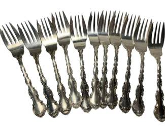 2015 - 11 Gorham Strasbourg Sterling Salad Forks 443 (Description): A set of eleven Gorham sterling silver forks featuring ornate handles with scrollwork detailing. Each fork measures 6.5 inches in length.