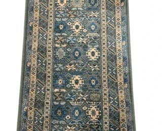 728 - Area rug measuring 59 inches by 32 inches