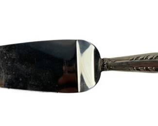 2001 - Serving Knife w/Sterling Handle 9.5 (Description): Stainless blade serving knife featuring a sterling silver handle. The piece measures 9.5 inches in length.