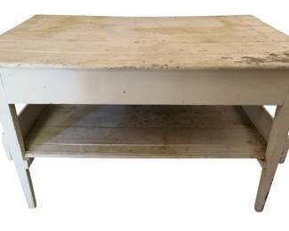 784 - Painted White Wood Table 28"x50"x36" (Description): Painted white wood table featuring a lower shelf. Measures 28 inches high by 50 inches wide by 36 inches deep.