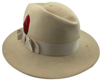 688 - Georgi Hat (Description): Features a classic fedora style with a grosgrain ribbon band and decorative feather accent.