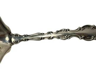 2028 - Gorham Sterling Strasbourg Ladle 76.8g (Description): Gorham sterling silver ladle featuring an ornate handle with scrollwork design and a shell-shaped bowl. Measures 7 inches