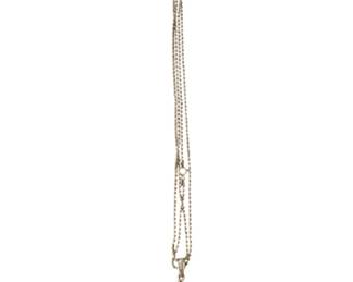 2043 - Sterling Silver Necklace w/ Pendant 35" 21g (Description): Sterling silver necklace featuring a blue stone donut pendant suspended from a delicate chain. The necklace measures 35 inches in length.
