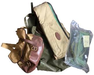 683 - Group Lot of Bags (Description): Group lot of bags including various styles and materials. The assortment features canvas and leather bags in different sizes suitable for various purposes.
