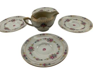293 - Coronado Czechoslovakia China Items (Description): Featuring delicate floral patterns with gold trim accents. The set includes plates and a creamer, each piece decorated with coordinating rose and floral motifs.