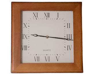 1094 - Clock 12.5"x4.5"x12.5" (Description): Quartz clock with a wooden frame and white face featuring Roman numerals. Measures 12 1/2" x 4 1/2" x 12.5". Used as-is electric/electronic/mechanical item. No guarantee all components present, untested if not otherwise stated.
