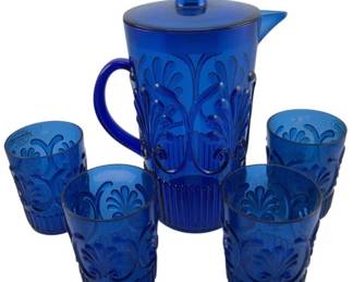 277 - Unbreakable Plastic Lemonade Set 5pc (Description): Unbreakable plastic tea set consisting of five pieces. The set includes a lidded pitcher and four matching tumblers in a coordinating design. Pitcher measures 18 inches by 6 inches. Tumblers measure 4.5 inches by 3.5 inches.