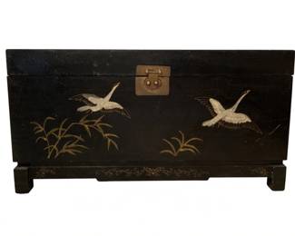 297 - Asian Wood Storage Chest 16"x30"x16" (Description): Featuring decorative motifs on a dark lacquered finish with brass hardware. Measures 16 inches high by 30 inches wide by 16 inches deep.