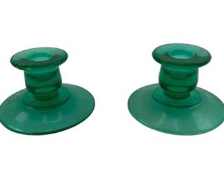 278 - Pr Vintage Green Glass Candlesticks (Description): Pair of green glass candlesticks. Each measures 2 1/2 inches tall by 4 inches in diameter.