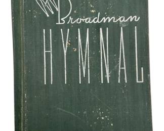 845 - The Broadman Hymnal (Description): The Broadman Hymnal, a classic church hymnal featuring a green cloth-bound cover with silver lettering and decorative pipe organ motif. This vintage hymnal shows age-related wear consistent with years of congregational use.